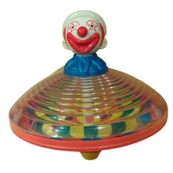 Vintage Clown Head Plunger Spinning Plastic Toy